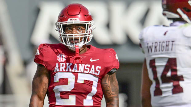 Razorbacks' Pooh Paul looking at Mississippi State quarterback Mike Wright on Saturday afternoon